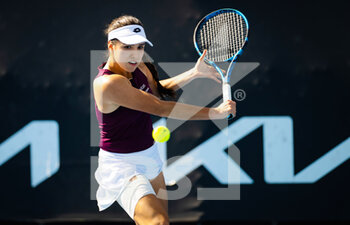 2023-01-16 - Camila Osorio of Colombia in action against Panna Udvardy of Hungary during the first round of the 2023 Australian Open, Grand Slam tennis tournament on January 16, 2023 in Melbourne, Australia - TENNIS - WTA - AUSTRALIA OPEN 2023 - WEEK 1 - INTERNATIONALS - TENNIS