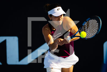 2023-01-16 - Camila Osorio of Colombia in action against Panna Udvardy of Hungary during the first round of the 2023 Australian Open, Grand Slam tennis tournament on January 16, 2023 in Melbourne, Australia - TENNIS - WTA - AUSTRALIA OPEN 2023 - WEEK 1 - INTERNATIONALS - TENNIS