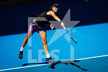 2023-01-17 - Garbine Muguruza of Spain in action against Elise Mertens of Belgium during the first round of the 2023 Australian Open, Grand Slam tennis tournament on January 17, 2023 in Melbourne, Australia - TENNIS - WTA - AUSTRALIA OPEN 2023 - WEEK 1 - INTERNATIONALS - TENNIS