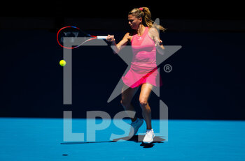 2023-01-21 - Camila Giorgi of Italy in action against Belinda Bencic of Switzerland during the third round of the 2023 Australian Open, Grand Slam tennis tournament on January 21, 2023 in Melbourne, Australia - TENNIS - WTA - AUSTRALIA OPEN 2023 - WEEK 1 - INTERNATIONALS - TENNIS