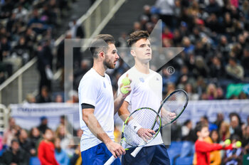 2023-02-05 - ALEXANDROS SKORILAS and PETROS TSITSIPAS of Greece during day two of the Davis Cup World Group I Play-off between Greece and Ecuador at Olympic Athletic Center of Athens 