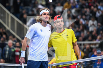 2023-02-05 - STEFANOS TSITSIPAS of Greece with ANDRES ANDRADE of Ecuador during day two of the Davis Cup World Group I Play-off between Greece and Ecuador at Olympic Athletic Center of Athens 