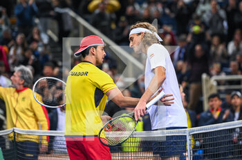 2023-02-05 - STEFANOS TSITSIPAS of Greece with ANDRES ANDRADE of Ecuador after winning the game during day two of the Davis Cup World Group I Play-off between Greece and Ecuador at Olympic Athletic Center of Athens 