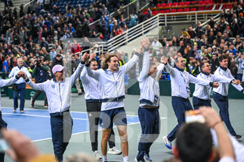 2023-02-05 - STEFANOS TSITSIPAS of Greece celebrating with teammates after winning the game during day two of the Davis Cup World Group I Play-off between Greece and Ecuador at Olympic Athletic Center of Athens 