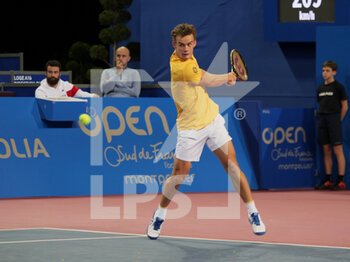 2023-02-07 - Luca Van Assche (FRA) in action against Marc-Andrea Huesler (SUI) during the Open Sud de France 2023, ATP 250 tennis tournament on February 7, 2023 at Sud de France Arena in Pérols near Montpellier, France - TENNIS - ATP - OPEN SUD DE FRANCE 2023 - INTERNATIONALS - TENNIS