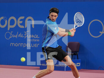 2023-02-07 - Arthur Rinderknech (FRA) in action against Luca Nardi (ITA) during the Open Sud de France 2023, ATP 250 tennis tournament on February 7, 2023 at Sud de France Arena in Pérols near Montpellier, France - TENNIS - ATP - OPEN SUD DE FRANCE 2023 - INTERNATIONALS - TENNIS