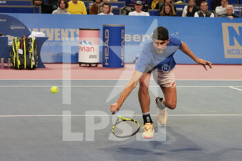 2023-02-11 - Maxime Cressy (USA) in action against Holger Rune (DEN) during the semi finals at the Open Sud de France 2023, ATP 250 tennis tournament on February 11, 2023 at Sud de France Arena in Pérols near Montpellier, France - TENNIS - ATP - OPEN SUD DE FRANCE 2023 - INTERNATIONALS - TENNIS