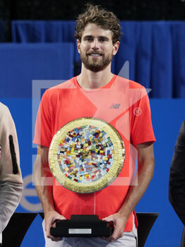 2023-02-12 - Maxime Cressy (USA) with the runner up trophy after the final of the Open Sud de France 2023, ATP 250 tennis tournament on February 12, 2023 at Sud de France Arena in Pérols near Montpellier, France - TENNIS - ATP - OPEN SUD DE FRANCE 2023 - INTERNATIONALS - TENNIS