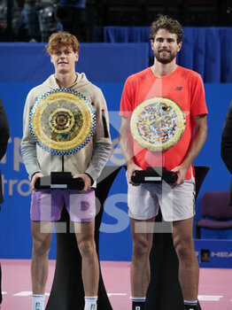 2023-02-12 - Jannik Sinner (ITA) with the winner's trophy and Maxime Cressy (USA) with the runner up trophy after the final of the Open Sud de France 2023, ATP 250 tennis tournament on February 12, 2023 at Sud de France Arena in Pérols near Montpellier, France - TENNIS - ATP - OPEN SUD DE FRANCE 2023 - INTERNATIONALS - TENNIS