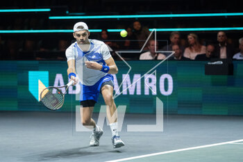2023-02-15 - Benjamin Bonzi of France in action against Jannik Sinner of Italy during the ABN Amro Open 2023, ATP 500 tennis tournament on February 15, 2023 in Rotterdam, Netherlands - TENNIS - ATP - ABN AMRO OPEN 2023 - INTERNATIONALS - TENNIS