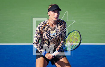 2023-02-17 - Ana Bogdan of Romania in action against Clara Burel of France during the first qualifications round of the 2023 Dubai Duty Free Tennis Championships WTA 1000 tennis tournament on February 17, 2023 in Dubai, UAE - TENNIS - WTA - DUBAI DUTY FREE 2023 - INTERNATIONALS - TENNIS