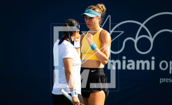 2023-03-23 - Paula Badosa of Spain & Ons Jabeur of Tunisia playing doubles at the 2023 Miami Open, WTA 1000 tennis tournament on March 23, 2023 in Miami, USA - TENNIS - WTA - 2023 MIAMI OPEN - INTERNATIONALS - TENNIS