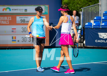 2023-03-28 - Anhelina Kalinina of Ukraine & Irina-Camelia Begu of Romania in action during the doubles quarter-final of the 2023 Miami Open, WTA 1000 tennis tournament on March 28, 2023 in Miami, USA - TENNIS - WTA - 2023 MIAMI OPEN - INTERNATIONALS - TENNIS