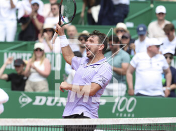 2023-04-10 - Stan Wawrinka of Switzerland celebrates his first round victory against Tallon Griekspoor of Netherlands during the Rolex Monte-Carlo Masters 2023, an ATP Masters 1000 tennis event on April 10, 2023 at Monte-Carlo Country Club in Roquebrune Cap Martin, France - TENNIS - ROLEX MONTE CARLO MASTERS 2023 - INTERNATIONALS - TENNIS