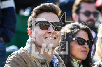 2023-04-11 - George RUSSELL with his girlfriend Carmen MONTERO MUNDT during the Rolex Monte-Carlo, ATP Masters 1000 tennis event on April 11, 2023 at Monte-Carlo Country Club in Roquebrune Cap Martin, France - TENNIS - ROLEX MONTE CARLO MASTERS 2023 - INTERNATIONALS - TENNIS