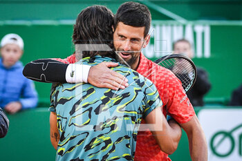 2023-04-13 - Lorenzo MUSETTI of Italia and Novak DJOKOVIC of Serbia during the Rolex Monte-Carlo, ATP Masters 1000 tennis event on April 13, 2023 at Monte-Carlo Country Club in Roquebrune Cap Martin, France - TENNIS - ROLEX MONTE CARLO MASTERS 2023 - INTERNATIONALS - TENNIS