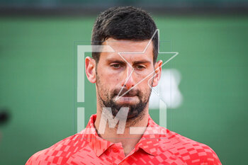 2023-04-13 - Novak DJOKOVIC of Serbia looks dejected during the Rolex Monte-Carlo, ATP Masters 1000 tennis event on April 13, 2023 at Monte-Carlo Country Club in Roquebrune Cap Martin, France - TENNIS - ROLEX MONTE CARLO MASTERS 2023 - INTERNATIONALS - TENNIS