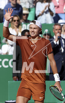 2023-04-14 - Holger Rune of Denmark celebrates his victory against Daniil Medvedev of Russia during day 6 of the Rolex Monte-Carlo Masters 2023, an ATP Masters 1000 tennis event on April 14, 2023 at Monte-Carlo Country Club in Roquebrune Cap Martin, France - TENNIS - ROLEX MONTE CARLO MASTERS 2023 - INTERNATIONALS - TENNIS