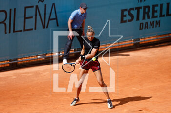 2023-04-25 - Arantxa Rus of The Netherlands in action against Anna-Lena Friedsman of Germany during the Mutua Madrid Open 2023, Masters 1000 tennis tournament on April 25, 2023 at Caja Magica in Madrid, Spain - TENNIS - MUTUA MADRID OPEN 2023 - INTERNATIONALS - TENNIS