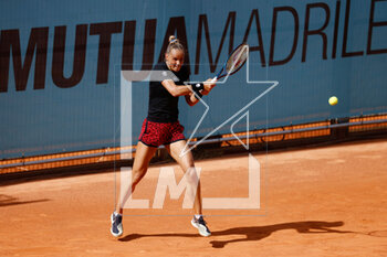 2023-04-25 - Arantxa Rus of The Netherlands in action against Anna-Lena Friedsman of Germany during the Mutua Madrid Open 2023, Masters 1000 tennis tournament on April 25, 2023 at Caja Magica in Madrid, Spain - TENNIS - MUTUA MADRID OPEN 2023 - INTERNATIONALS - TENNIS