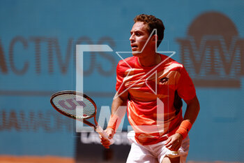 2023-04-26 - Roberto Carballes of Spain in action against David Goffin of Belgium during the Mutua Madrid Open 2023, Masters 1000 tennis tournament on April 26, 2023 at Caja Magica in Madrid, Spain - TENNIS - MUTUA MADRID OPEN 2023 - INTERNATIONALS - TENNIS
