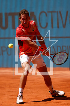 2023-04-26 - Roberto Carballes of Spain in action against David Goffin of Belgium during the Mutua Madrid Open 2023, Masters 1000 tennis tournament on April 26, 2023 at Caja Magica in Madrid, Spain - TENNIS - MUTUA MADRID OPEN 2023 - INTERNATIONALS - TENNIS