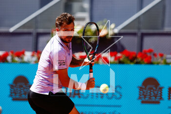 2023-04-26 - Stan Wawrinka of Switzerland in action against Maxime Cressy of United States during the Mutua Madrid Open 2023, Masters 1000 tennis tournament on April 26, 2023 at Caja Magica in Madrid, Spain - TENNIS - MUTUA MADRID OPEN 2023 - INTERNATIONALS - TENNIS