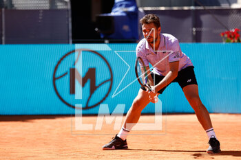 2023-04-26 - Stan Wawrinka of Switzerland in action against Maxime Cressy of United States during the Mutua Madrid Open 2023, Masters 1000 tennis tournament on April 26, 2023 at Caja Magica in Madrid, Spain - TENNIS - MUTUA MADRID OPEN 2023 - INTERNATIONALS - TENNIS