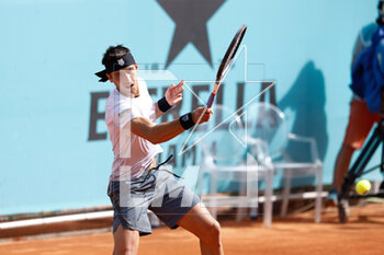 2023-04-27 - Tomas Martin Etcheverry of Argentina in action against Adrian Mannarino of France during the Mutua Madrid Open 2023, Masters 1000 tennis tournament on April 27, 2023 at Caja Magica in Madrid, Spain - TENNIS - MUTUA MADRID OPEN 2023 - INTERNATIONALS - TENNIS