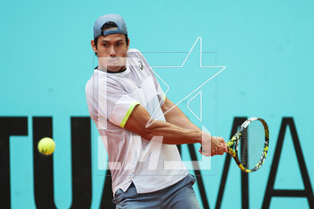 2023-04-27 - Jason Kluber of Australia in action against Dusan Lajovic of Serbia during the Mutua Madrid Open 2023, Masters 1000 tennis tournament on April 27, 2023 at Caja Magica in Madrid, Spain - TENNIS - MUTUA MADRID OPEN 2023 - INTERNATIONALS - TENNIS
