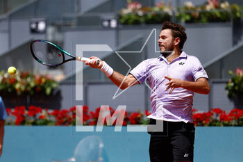 2023-04-28 - Stan Wawrinka of Switzerland in action against Andrey Rublev of Russia during the Mutua Madrid Open 2023, Masters 1000 tennis tournament on April 28, 2023 at Caja Magica in Madrid, Spain - TENNIS - MUTUA MADRID OPEN 2023 - INTERNATIONALS - TENNIS