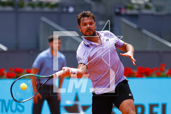 2023-04-28 - Stan Wawrinka of Switzerland in action against Andrey Rublev of Russia during the Mutua Madrid Open 2023, Masters 1000 tennis tournament on April 28, 2023 at Caja Magica in Madrid, Spain - TENNIS - MUTUA MADRID OPEN 2023 - INTERNATIONALS - TENNIS