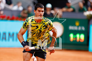 2023-04-28 - Carlos Alcaraz of Spain in action against Emil Ruusuvuori of Finland during the Mutua Madrid Open 2023, Masters 1000 tennis tournament on April 28, 2023 at Caja Magica in Madrid, Spain - TENNIS - MUTUA MADRID OPEN 2023 - INTERNATIONALS - TENNIS