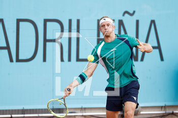 2023-04-28 - Alejandro Davidovich of Spain in action against Albert Ramos-Vinolas of Spain during the Mutua Madrid Open 2023, Masters 1000 tennis tournament on April 28, 2023 at Caja Magica in Madrid, Spain - TENNIS - MUTUA MADRID OPEN 2023 - INTERNATIONALS - TENNIS