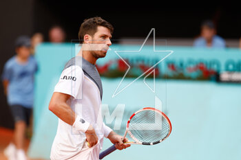2023-04-29 - Cameron Norrie of Great Britain in action against Yosuke Watanuki of Japan during the Mutua Madrid Open 2023, Masters 1000 tennis tournament on April 29, 2023 at Caja Magica in Madrid, Spain - TENNIS - MUTUA MADRID OPEN 2023 - INTERNATIONALS - TENNIS