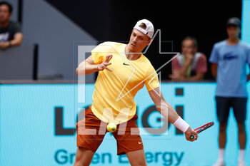 2023-04-29 - Denis Shapovalop of Canada in action against Zhizhen Zhang of China during the Mutua Madrid Open 2023, Masters 1000 tennis tournament on April 29, 2023 at Caja Magica in Madrid, Spain - TENNIS - MUTUA MADRID OPEN 2023 - INTERNATIONALS - TENNIS
