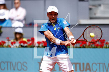 2023-04-30 - Roberto Bautista Agut of Spain in action against Karen Khachanov of Russia during the Mutua Madrid Open 2023, Masters 1000 tennis tournament on April 30, 2023 at Caja Magica in Madrid, Spain - TENNIS - MUTUA MADRID OPEN 2023 - INTERNATIONALS - TENNIS