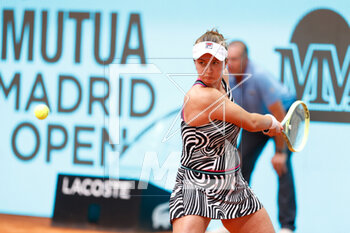 2023-04-30 - Barbora Krejcikova of Czech Republic in action against Xiyu Wang of China during the Mutua Madrid Open 2023, Masters 1000 tennis tournament on April 30, 2023 at Caja Magica in Madrid, Spain - TENNIS - MUTUA MADRID OPEN 2023 - INTERNATIONALS - TENNIS