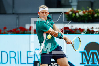 2023-04-30 - Alejandro Davidovich of Spain in action against Holger Rune of Denmark during the Mutua Madrid Open 2023, Masters 1000 tennis tournament on April 30, 2023 at Caja Magica in Madrid, Spain - TENNIS - MUTUA MADRID OPEN 2023 - INTERNATIONALS - TENNIS