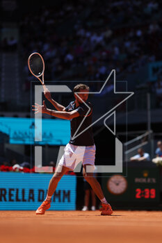2023-05-01 - Daniil Medvedev (Rus) in action against Alexander Sevchenko (Rus) during the Mutua Madrid Open 2023, Masters 1000 tennis tournament on May 1, 2023 at Caja Magica in Madrid, Spain - TENNIS - MUTUA MADRID OPEN 2023 - INTERNATIONALS - TENNIS