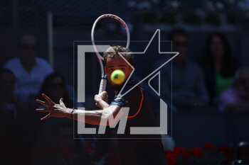 2023-05-01 - Daniil Medvedev (Rus) in action against Alexander Sevchenko (Rus) during the Mutua Madrid Open 2023, Masters 1000 tennis tournament on May 1, 2023 at Caja Magica in Madrid, Spain - TENNIS - MUTUA MADRID OPEN 2023 - INTERNATIONALS - TENNIS