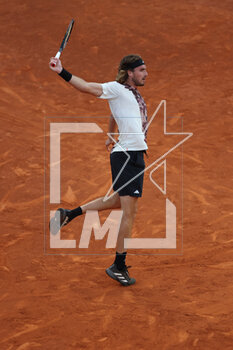 2023-05-01 - Stefanos Tsitsipas (Gre) in action against Sebastian Baez (Arg) during the Mutua Madrid Open 2023, Masters 1000 tennis tournament on May 1, 2023 at Caja Magica in Madrid, Spain - TENNIS - MUTUA MADRID OPEN 2023 - INTERNATIONALS - TENNIS