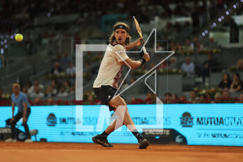 2023-05-01 - Stefanos Tsitsipas (Gre) in action against Sebastian Baez (Arg) during the Mutua Madrid Open 2023, Masters 1000 tennis tournament on May 1, 2023 at Caja Magica in Madrid, Spain - TENNIS - MUTUA MADRID OPEN 2023 - INTERNATIONALS - TENNIS