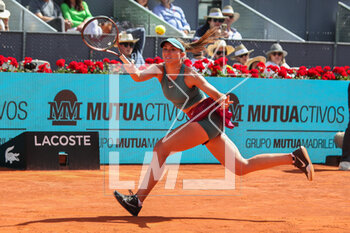 2023-05-01 - Paula Badosa of Spain in action against Maria Sakkari of Greece during the Mutua Madrid Open 2023, Masters 1000 tennis tournament on May 1, 2023 at Caja Magica in Madrid, Spain - TENNIS - MUTUA MADRID OPEN 2023 - INTERNATIONALS - TENNIS