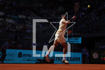 2023-05-02 - Karen Khachanov (Rus) in action against Andrey Rublev (Rus) during the Mutua Madrid Open 2023, Masters 1000 tennis tournament on May 2, 2023 at Caja Magica in Madrid, Spain - TENNIS - MUTUA MADRID OPEN 2023 - INTERNATIONALS - TENNIS
