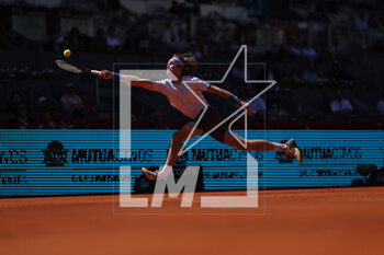 2023-05-02 - Andrey Rublev (Rus) in action against Karen Khachanov (Rus) during the Mutua Madrid Open 2023, Masters 1000 tennis tournament on May 2, 2023 at Caja Magica in Madrid, Spain - TENNIS - MUTUA MADRID OPEN 2023 - INTERNATIONALS - TENNIS
