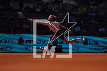 2023-05-02 - Andrey Rublev (Rus) in action against Karen Khachanov (Rus) during the Mutua Madrid Open 2023, Masters 1000 tennis tournament on May 2, 2023 at Caja Magica in Madrid, Spain - TENNIS - MUTUA MADRID OPEN 2023 - INTERNATIONALS - TENNIS
