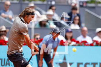2023-05-02 - Alexander Zverev of Germany in action against Carlos Alcaraz of Spain during the Mutua Madrid Open 2023, Masters 1000 tennis tournament on May 2, 2023 at Caja Magica in Madrid, Spain - TENNIS - MUTUA MADRID OPEN 2023 - INTERNATIONALS - TENNIS