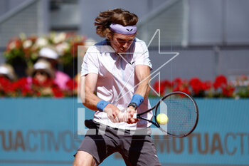 2023-05-02 - Andrey Rublev of Russia in action against Karen Khachanov of Russia during the Mutua Madrid Open 2023, Masters 1000 tennis tournament on May 2, 2023 at Caja Magica in Madrid, Spain - TENNIS - MUTUA MADRID OPEN 2023 - INTERNATIONALS - TENNIS