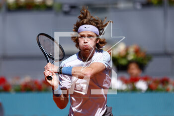 2023-05-02 - Andrey Rublev of Russia in action against Karen Khachanov of Russia during the Mutua Madrid Open 2023, Masters 1000 tennis tournament on May 2, 2023 at Caja Magica in Madrid, Spain - TENNIS - MUTUA MADRID OPEN 2023 - INTERNATIONALS - TENNIS